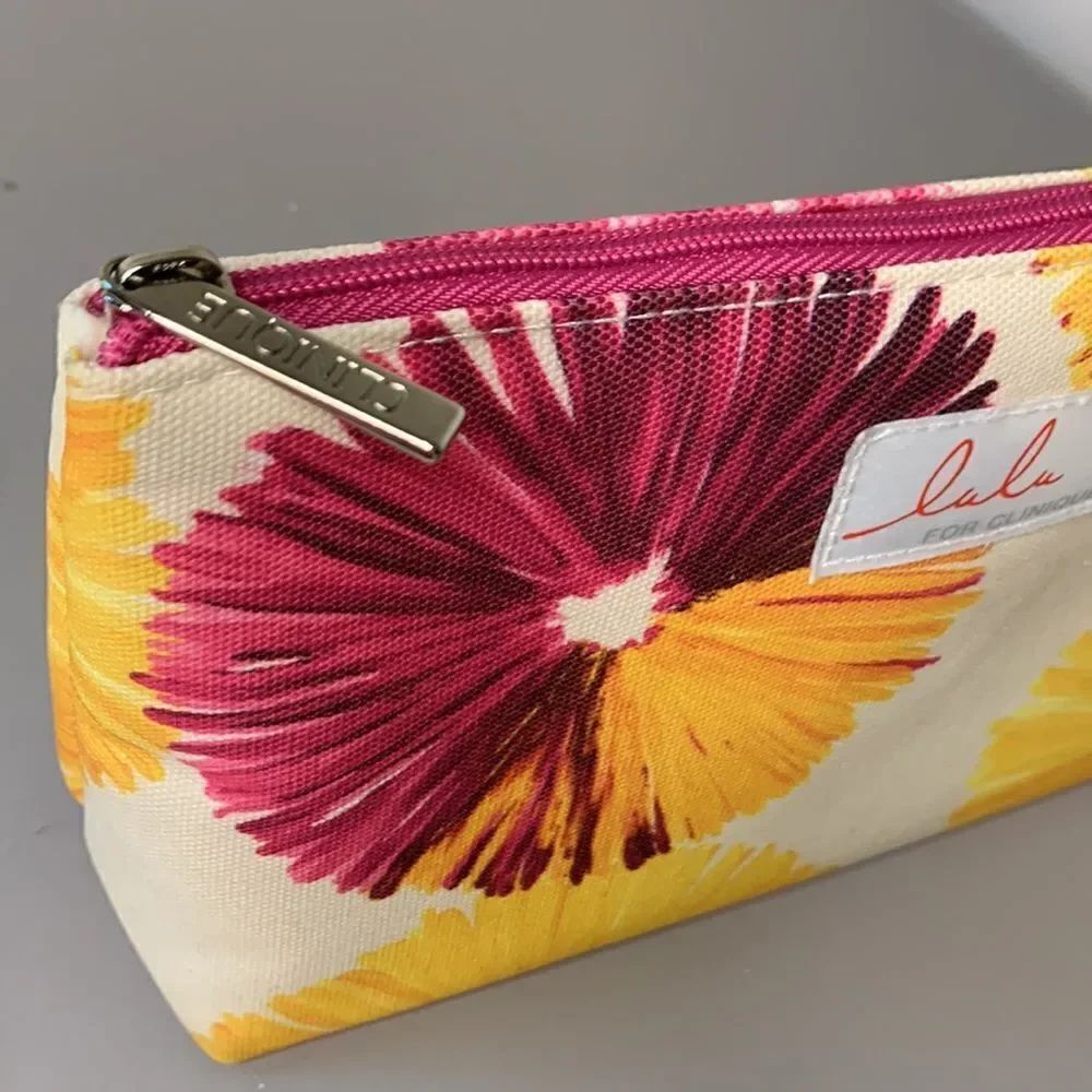EUC Clinique LaLa DK makeup bag